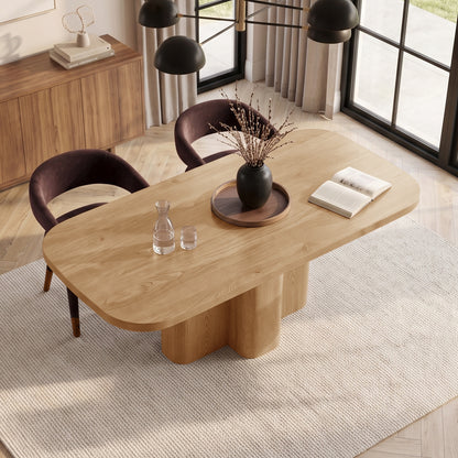 Modern wooden dining table with chairs in a styled dining room