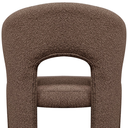 Lunari Bouclé Curved Accent Chair in Brown features a textured fabric, rounded backrest with cut-out, and padded seat, embodying comfort and style for modern spaces.