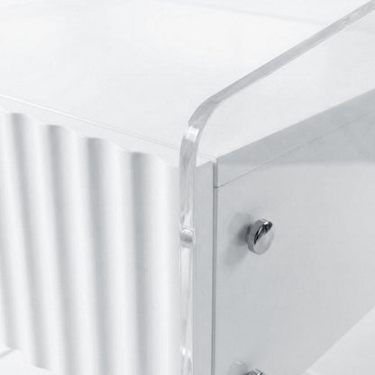 Corner detail of acrylic furniture showing ribbed panel and knob