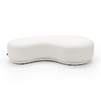 Cream white curved upholstered bench seat on a white background