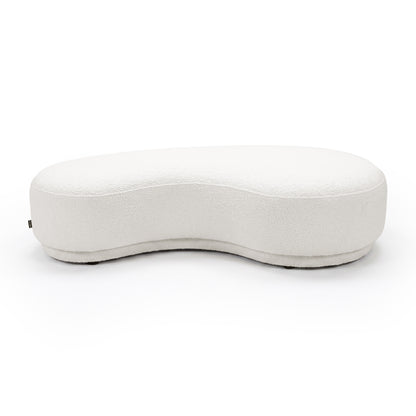 Cream white curved upholstered bench seat on a white background