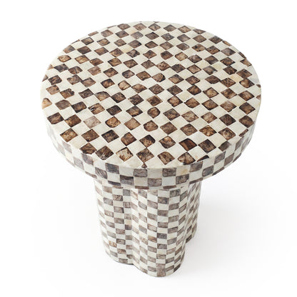 Pedestal-style checkered side table on white background from above