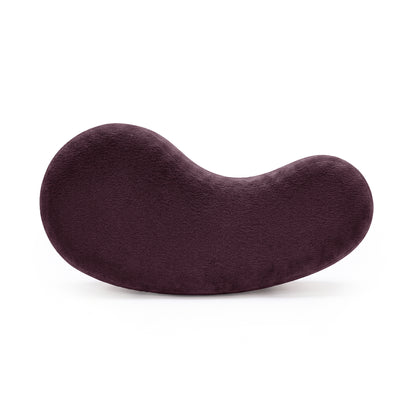 Plum kidney-bean shaped cushion on a white background