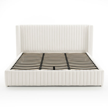 Front view of cream upholstered bed frame on white background