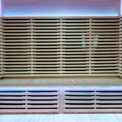 Interior view of a modern sauna with wooden slats and LED lighting