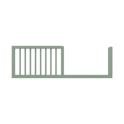 Green toddler bed safety rail on white background