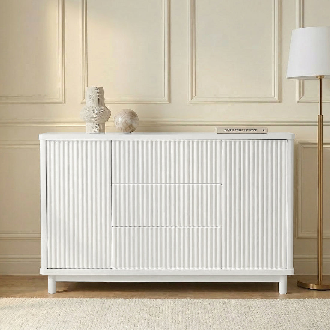White sideboard with decorative props in a lifestyle interior