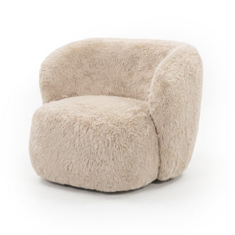 Beige plush accent chair shown in full on a white background