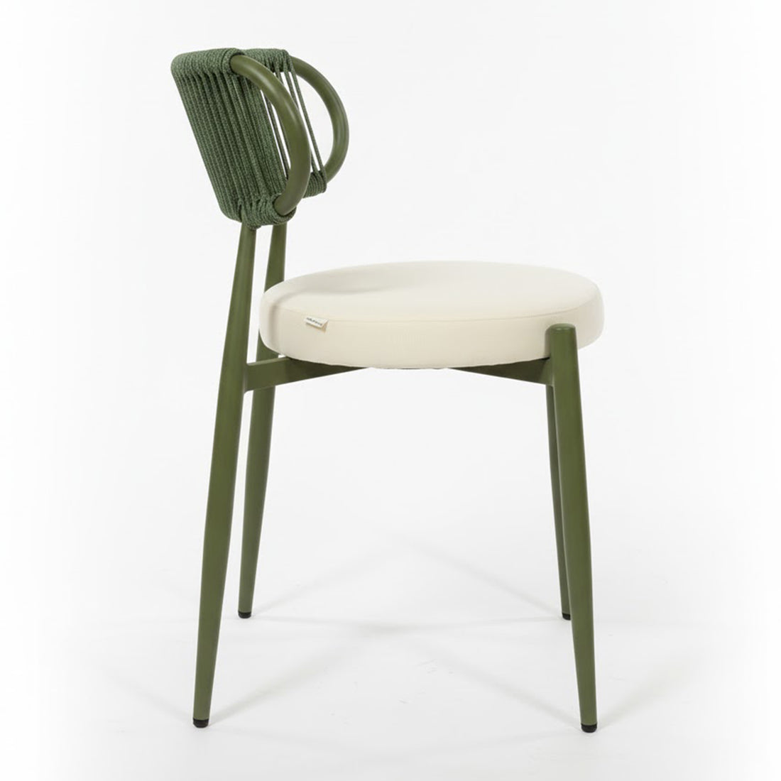 Cabria 9 Piece Sintered Stone Outdoor Dining Set in Green features an olive-green metal-framed chair with a cream cushioned seat and decorative woven backrest, exemplifying modern minimalist design.