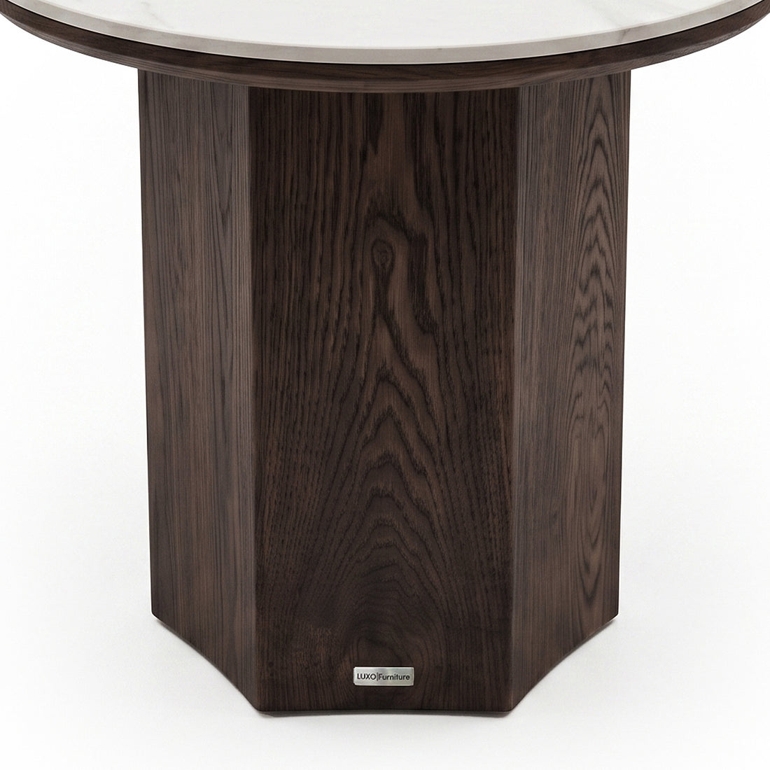 Elegant side table with a dark faceted wooden base and circular glass top on a white background