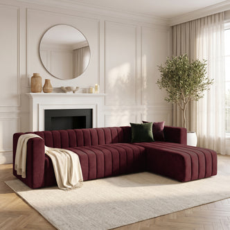 Dark Merlot sectional sofa styled in a bright, elegant living room.