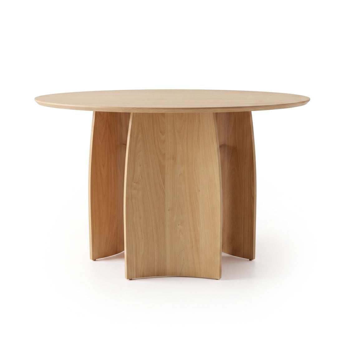 Round wooden dining table on a white background