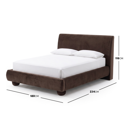 Upholstered bed on white background with dimension lines showing size