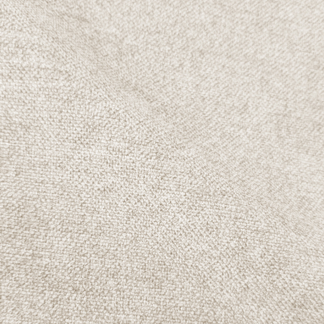 Close-up of beige upholstered chair fabric texture