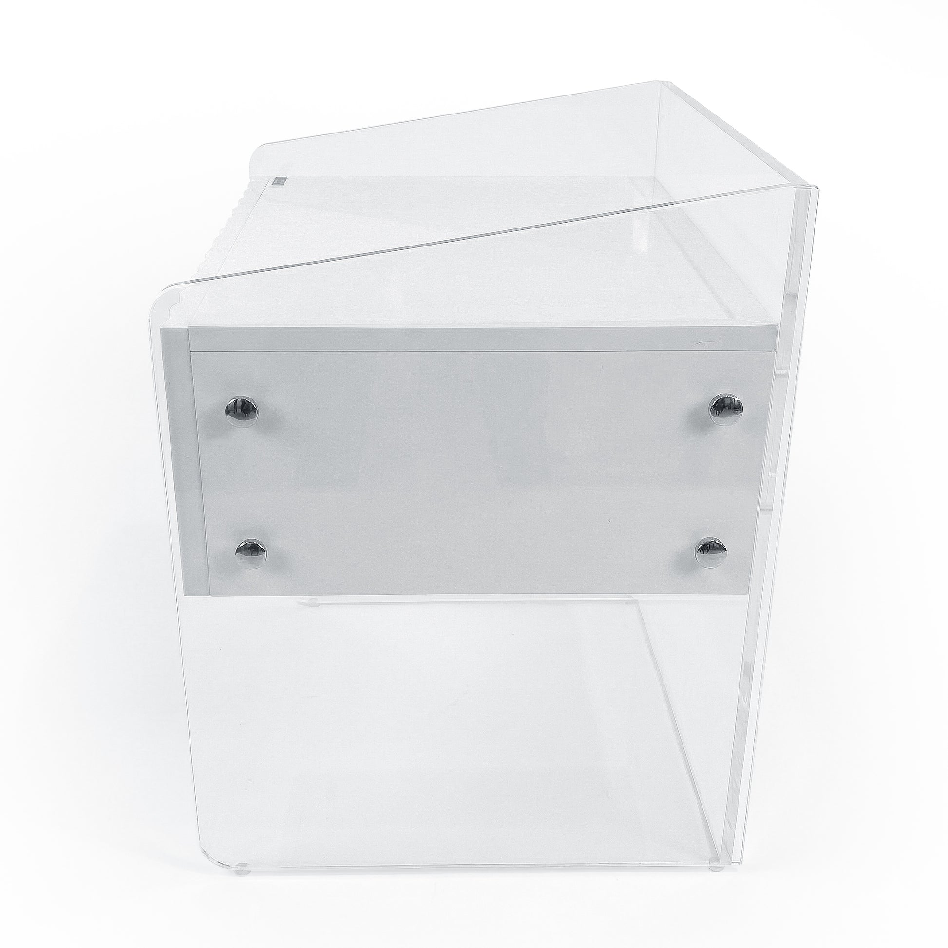 Clear acrylic furniture piece with internal drawer on white background