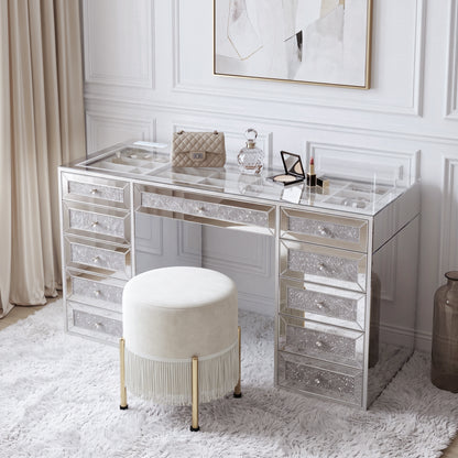 Mirrored vanity desk with stool in a styled bedroom setting