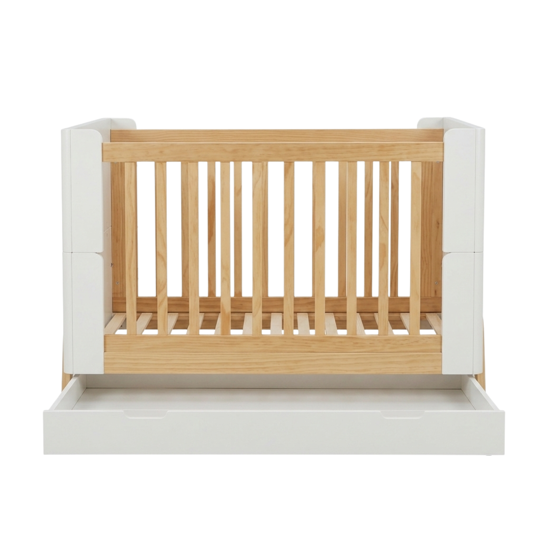 Baby crib with white panels and wood slats on white background