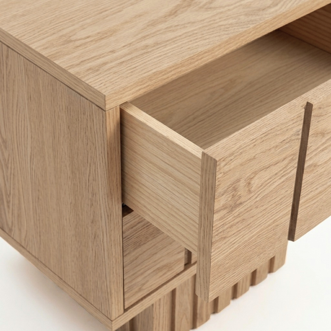 Close view of wooden nightstand with one drawer open