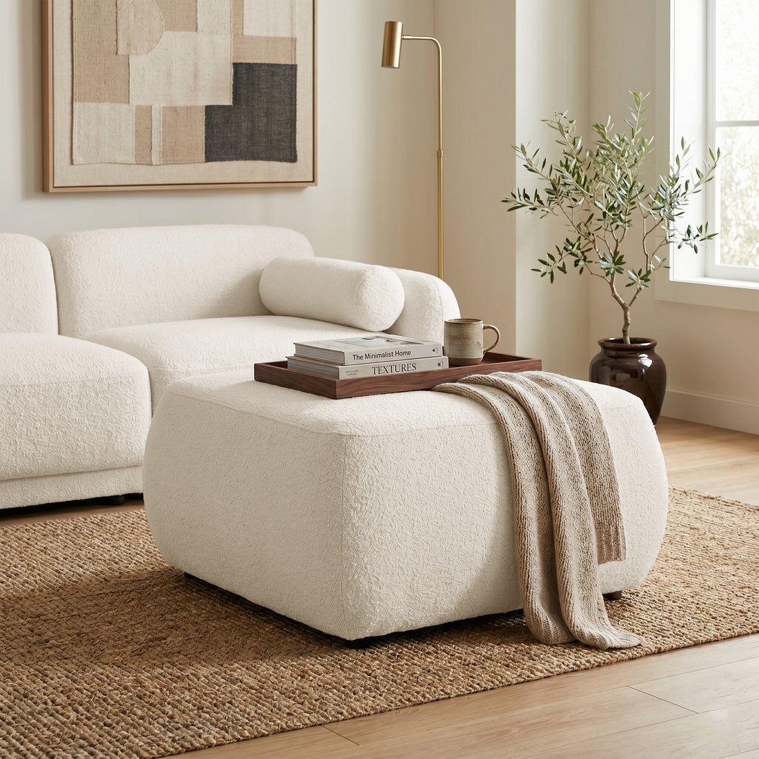 Ottoman styled in a bright, modern living room