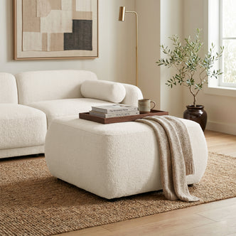 Ottoman styled in a bright, modern living room
