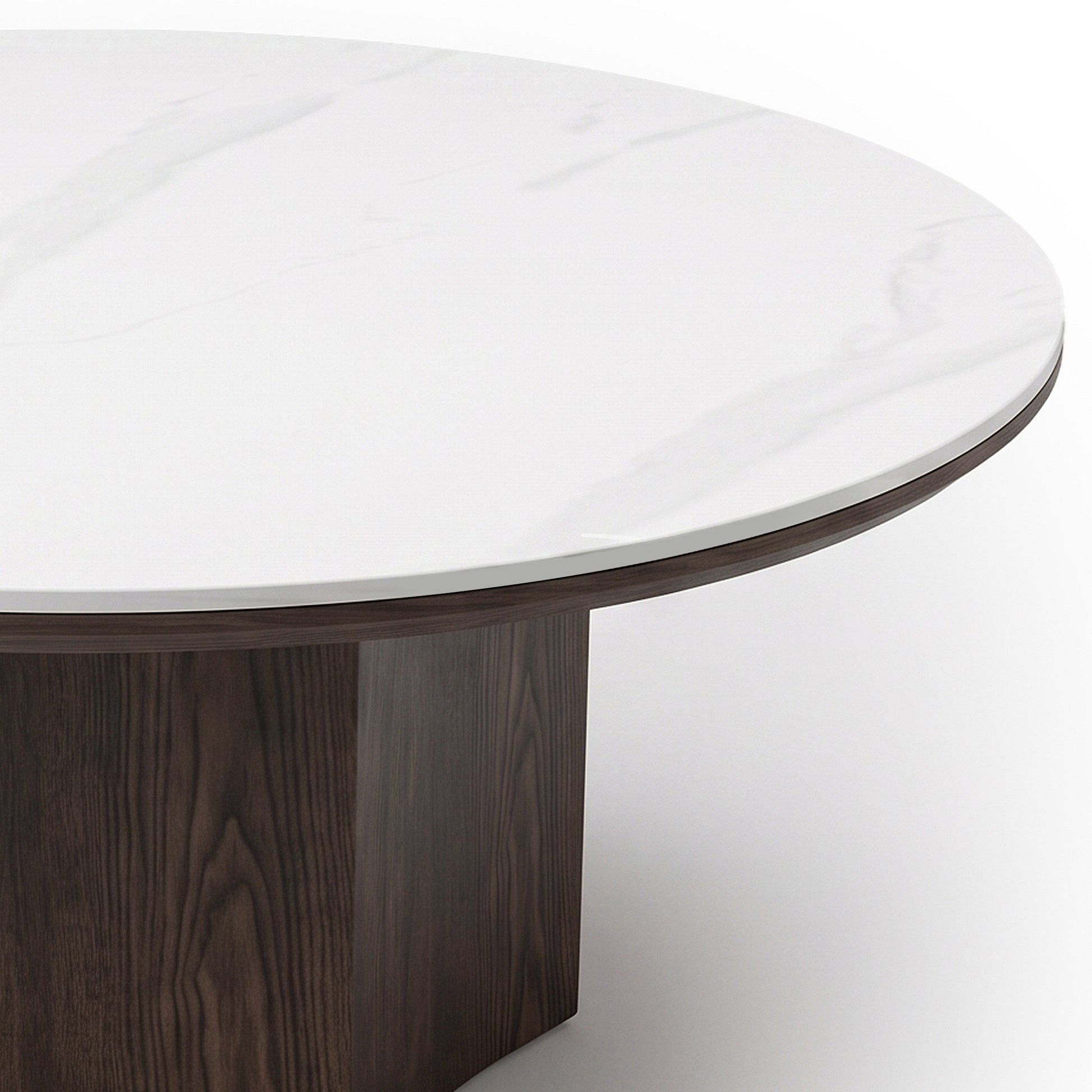 Close-up of a round table with a white marble-like top and dark wood base on a white background