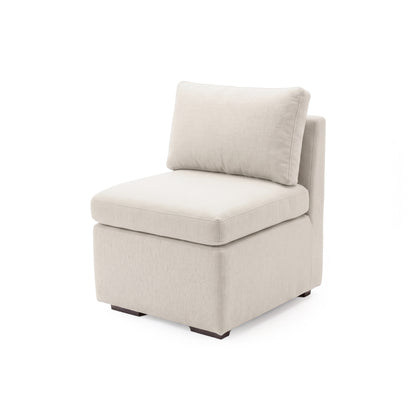 Compact cream upholstered armless chair on white background