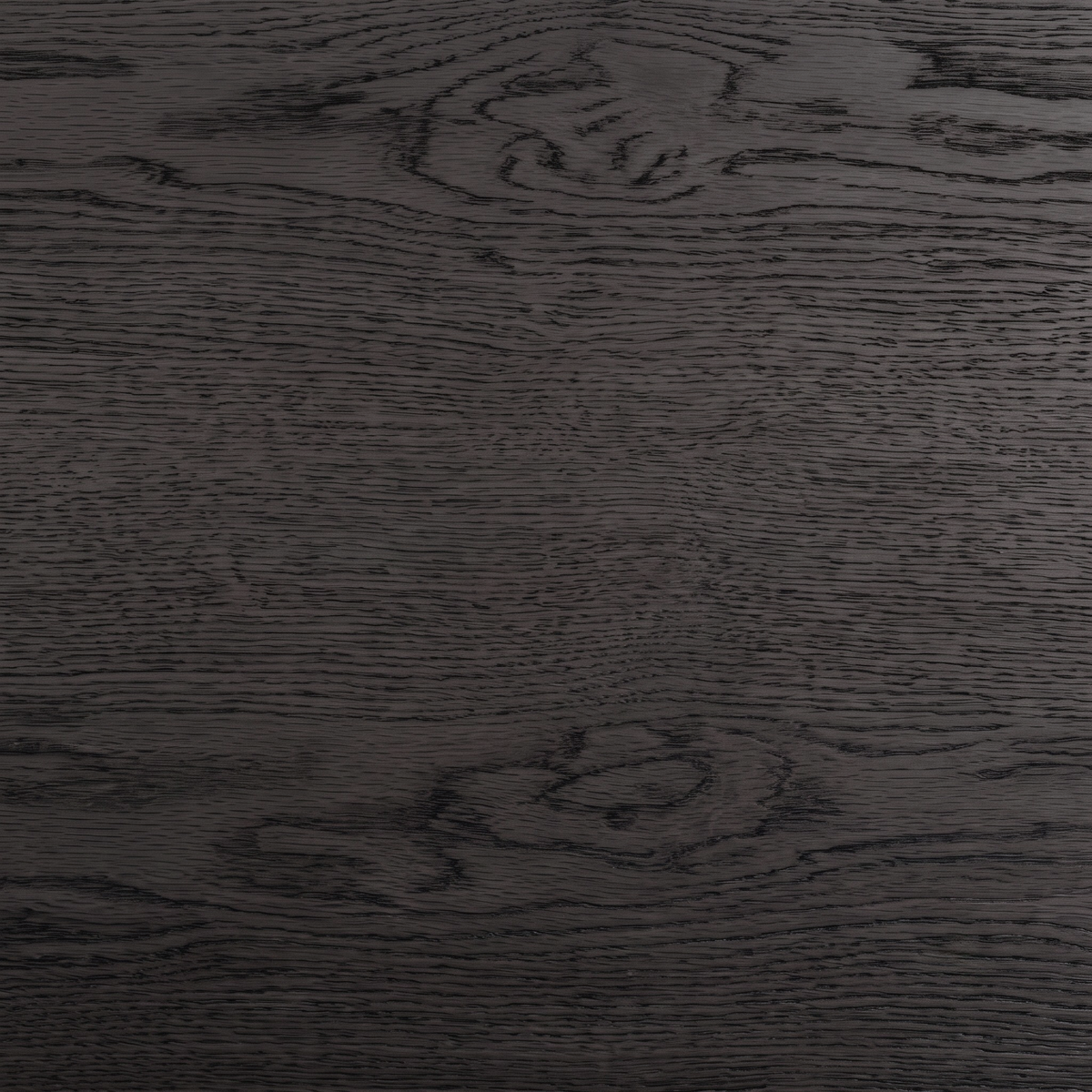Close-up of dark wood grain texture on the product surface