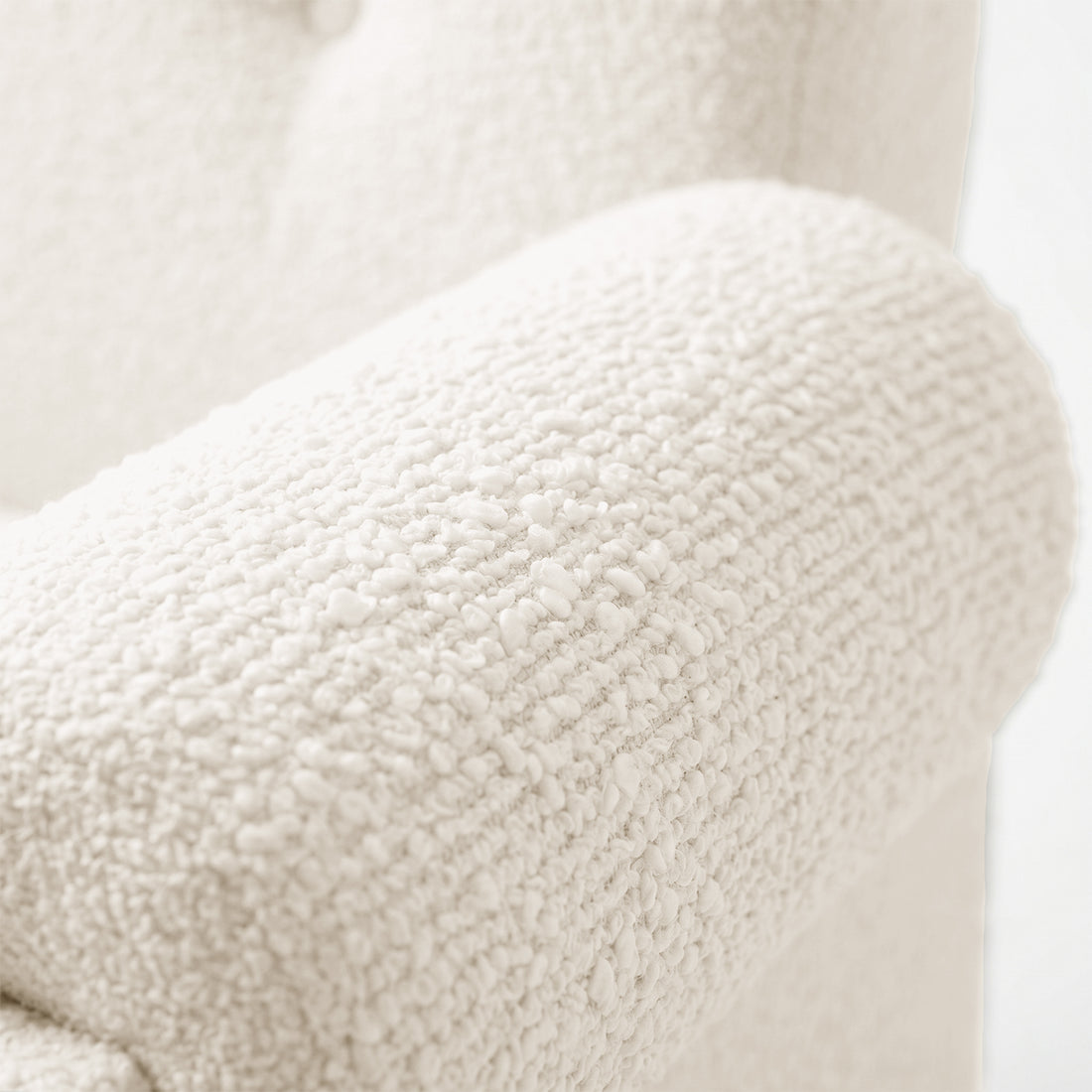 Close-up of armrest texture against neutral background