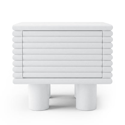 White minimalist side table with slatted front on white background