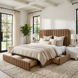 Lifestyle shot of upholstered bed with under-bed storage drawers in a bright bedroom