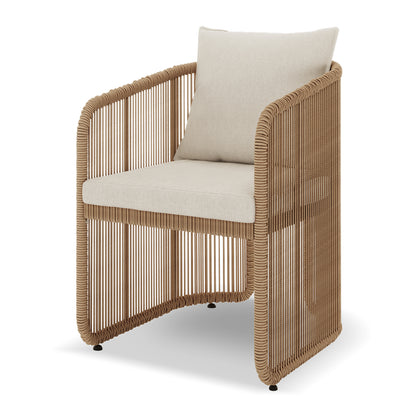 Vellora 4 Seater Wicker Outdoor Dining Set in Natural features a modern armchair with a woven-rope frame, light beige cushions, and a sleek metal structure, perfect for stylish indoor or patio seating.