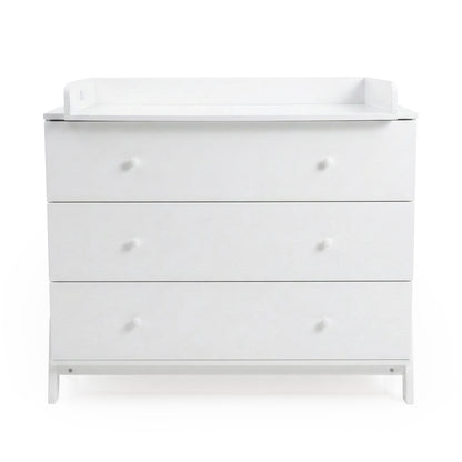 White three-drawer dresser with changing tray against white background