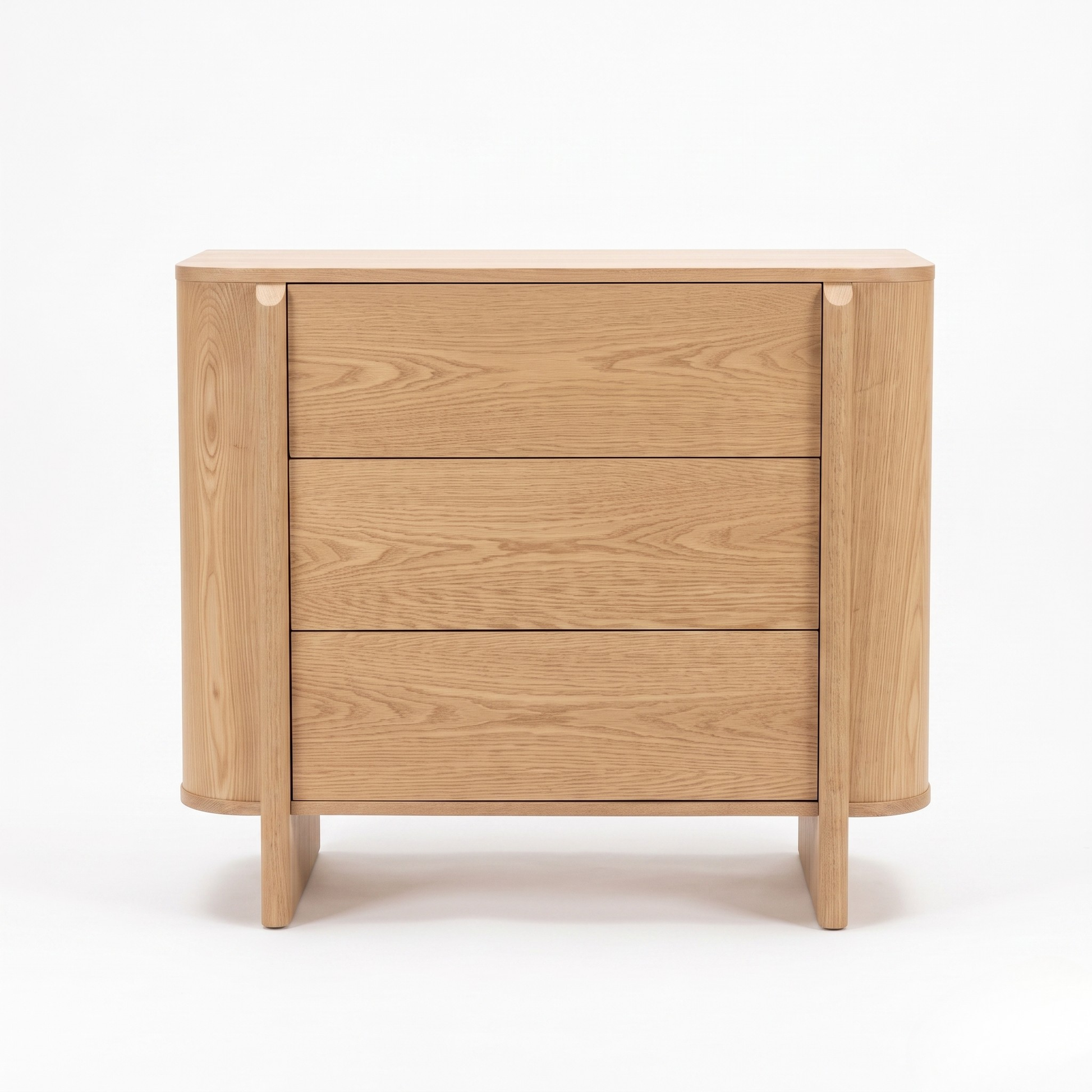 Wooden three-drawer dresser on a white background