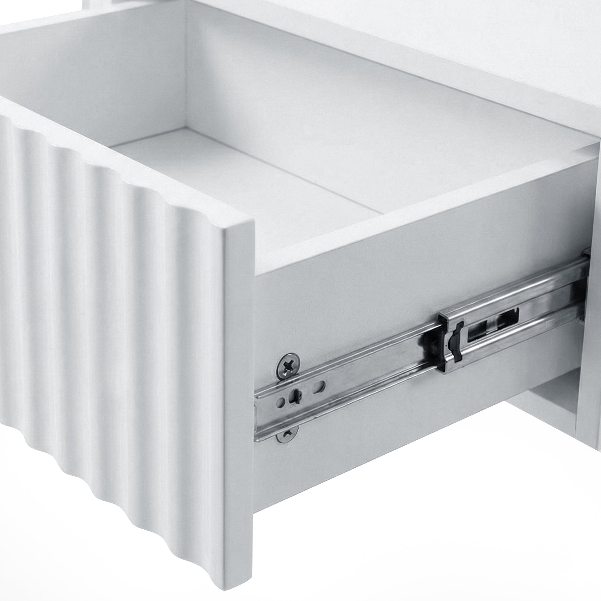 Close-up of textured drawer front and sliding mechanism