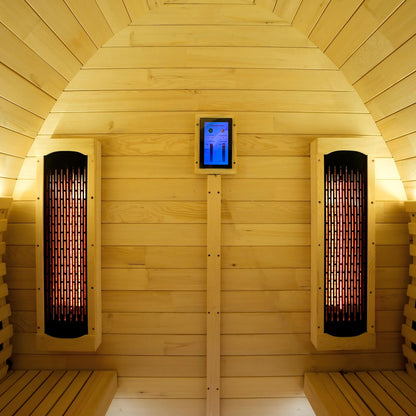 Interior wooden sauna with vertical heaters and partial seating area