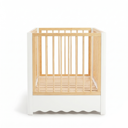 Wood and white baby crib on white background