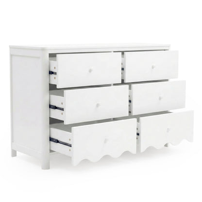 White dresser on white background with drawers partially open