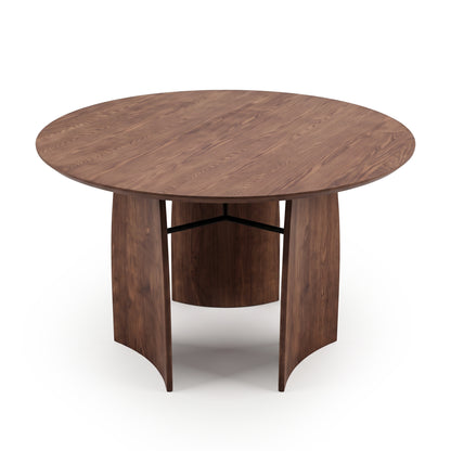Round wooden table on a white background with curved panel legs