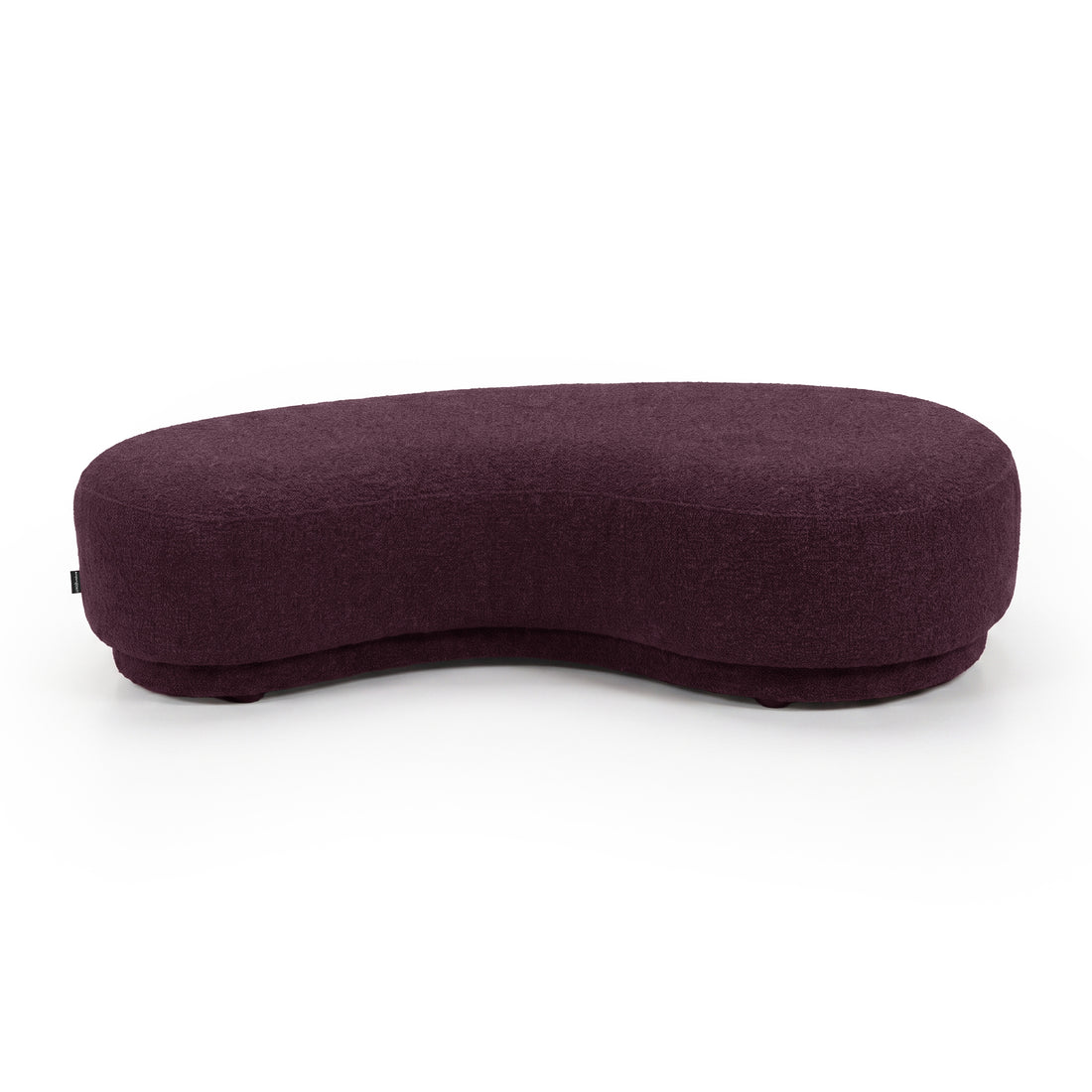 Modern bean-shaped plum upholstered bench seat on a white background