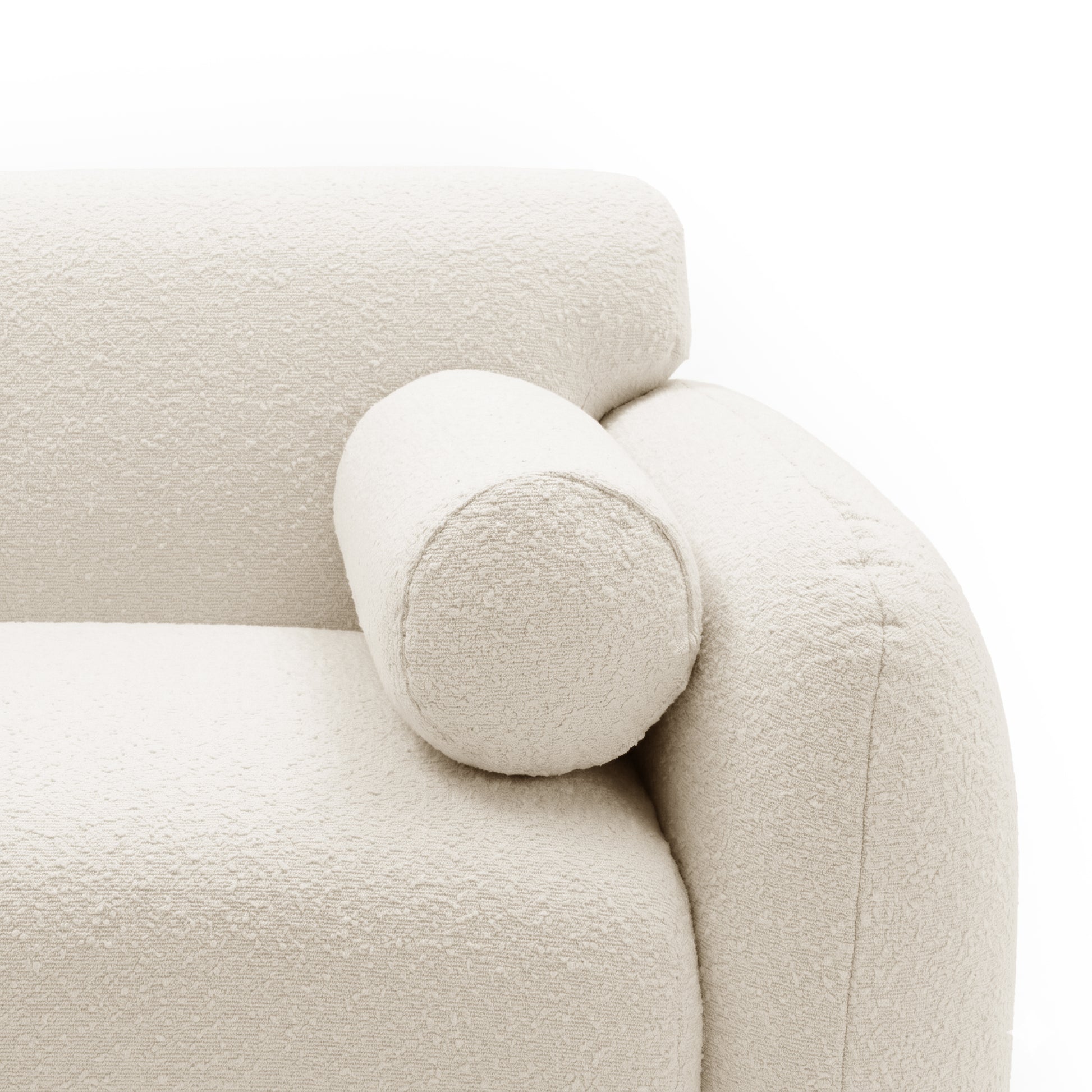 Close-up of sofa armrest and bolster pillow on white background