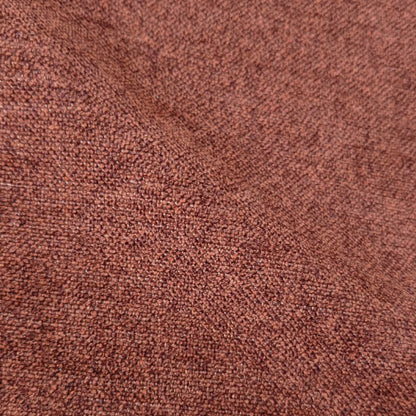 Macro close-up of rust terracotta woven upholstery fabric