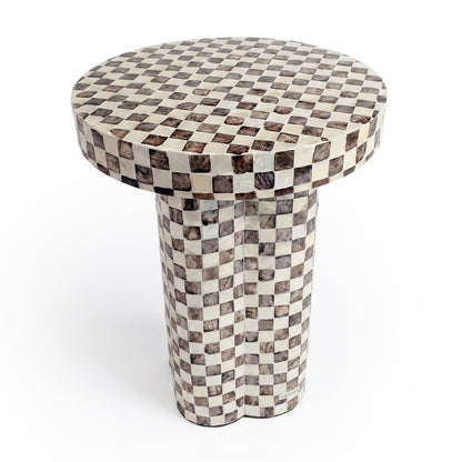 Round checkered side table on white background, angled top and base visible