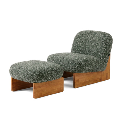 Green lounge chair and ottoman set on white background