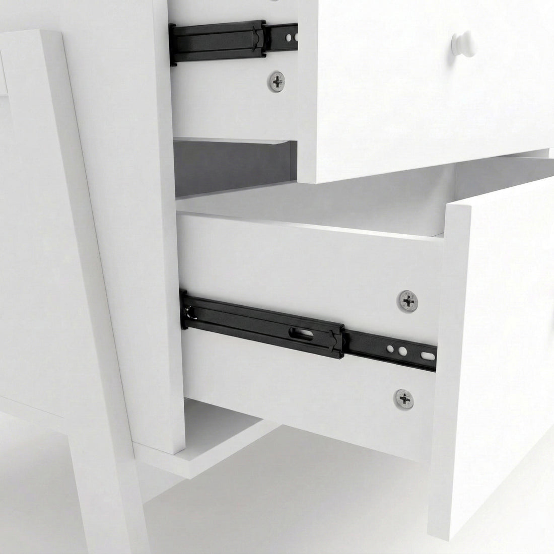 Close-up of drawer slide mechanism inside white dresser
