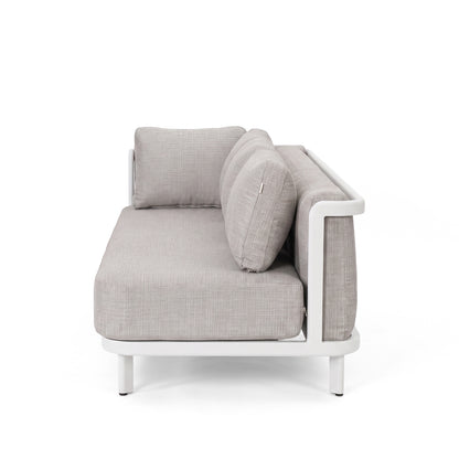 Side portion of a light gray upholstered seating unit with a white metal frame on a white background.
