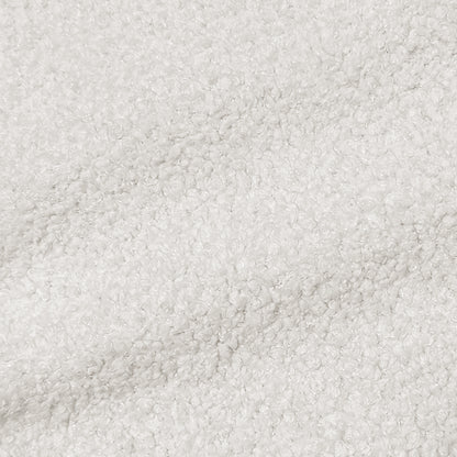 Close-up of white textured sherpa-like fabric