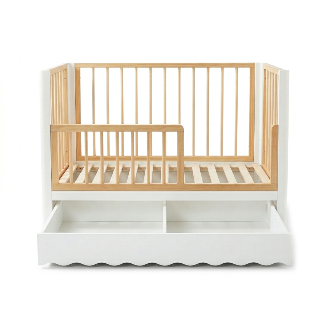White and natural wood crib with open lower compartments on white background