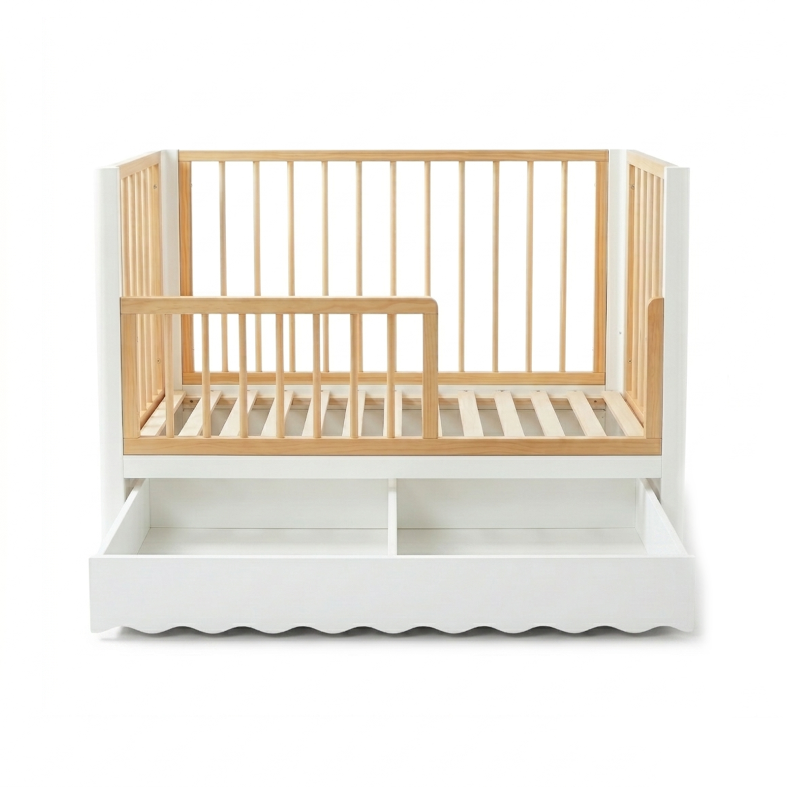 White and natural wood crib with open lower compartments on white background