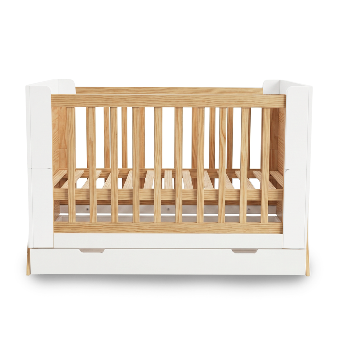 Modern baby crib with slatted sides and base drawer on white background