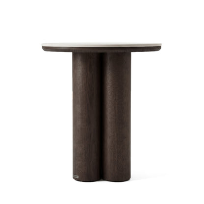 Round dark wood side table on a white background